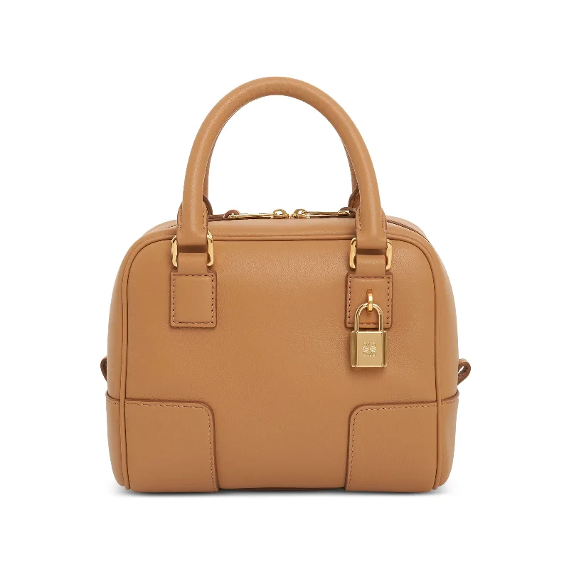 Rattan Bucket Bag in Natural Color with Beadwork for a Tropical VacationAmazona 16 Square Bag in Nappa Calfskin in Warm Desert