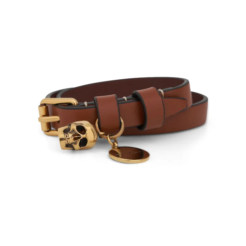 Bucket Bag with Embossed Animal Print in Tan for a Wild and Stylish StatementDouble Skull Wrap Bracelet in Tan