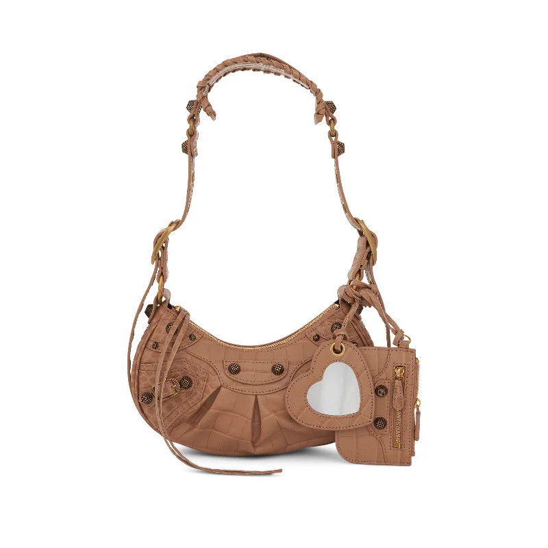 Rattan Bucket Bag in Natural Color with Beadwork for a Tropical VacationLe Cagole Embossed Croco Shoulder Bag XS in Nude Beige