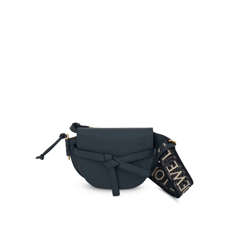 Women's Drawstring Bucket Bag in Mustard Yellow with Pockets for PracticalityMini Gate Dual Bag in Soft Calfskin and Jacquard Strap in Onyx Blue