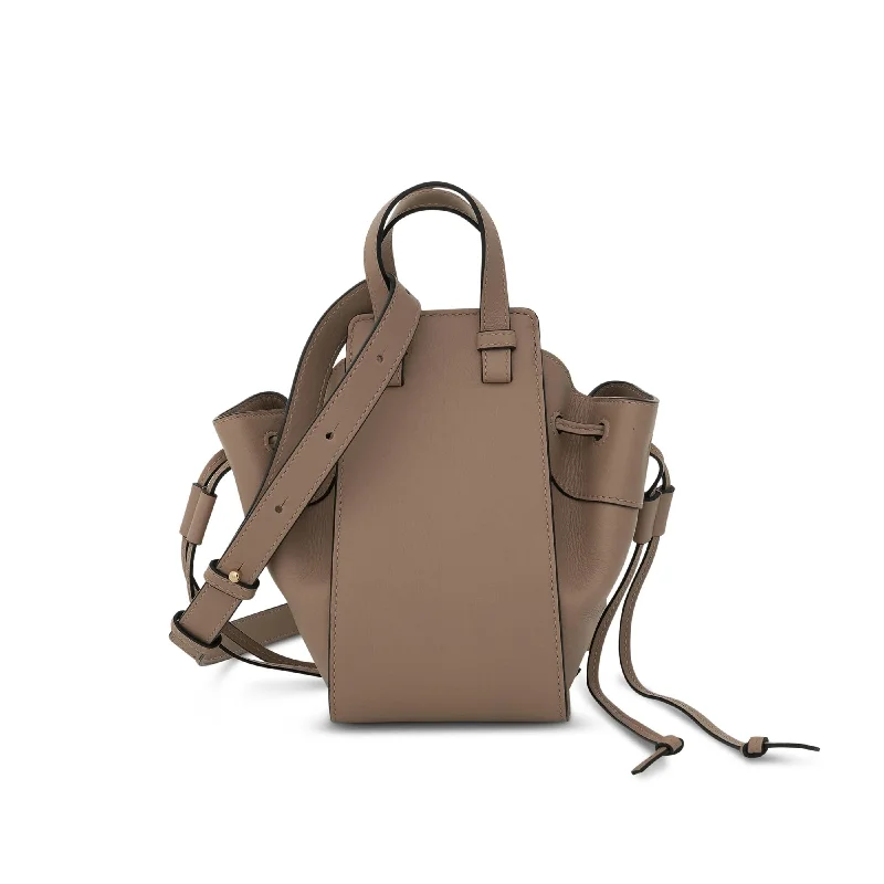 Bucket Bag with Geometric Print in Multicolor for a Contemporary and Eye - Catching AppealMini Hammock Drawstring Bag in Calfskin in Sand