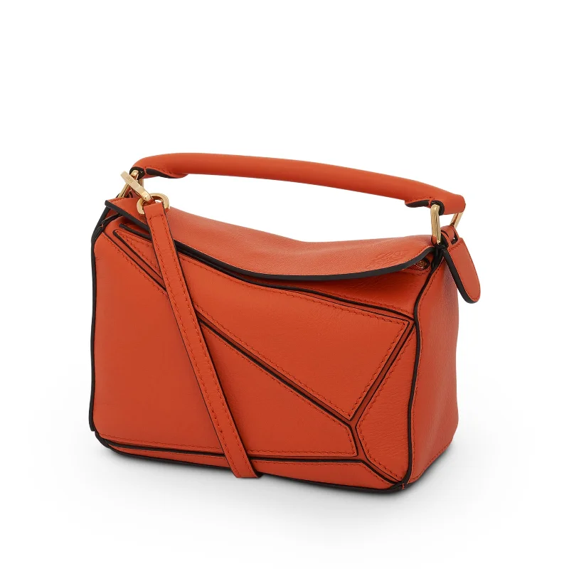 Women's Printed Bucket Bag in Floral Patterns for a Spring - Themed Day at the ParkMini Puzzle Bag in Classic Calfskin in Orange
