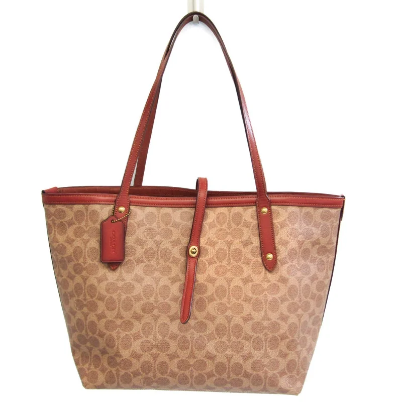 Linen Tote Bag in Natural Beige with Braided Details for a Rustic Summer EnsembleCoach Signature  Canvas Tote Bag (Pre-Owned)