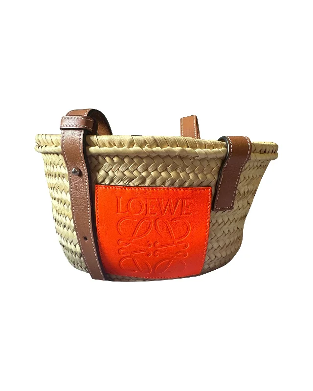 Patchwork Tote Bag in Denim with Vintage - Inspired Designs for a Retro AppealLoewe Small Basket Bag in Beige Raffia and Orange Calfskin Leather Patchwork Tote Bag in Denim with Vintage - Inspired Designs for a Retro AppealLoewe Small Basket Bag in Beige Raffia and Orange Calfskin Leather