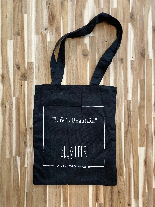 Monogrammed Tote Bag in Brown Leather with Personalized Initials for a Custom and Elegant TouchThe "Life is Beautiful" Quote Tote Medium (Black Canvass)