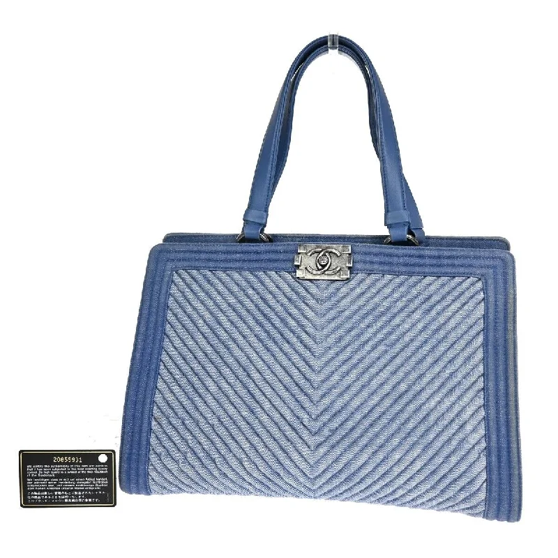 Suede Clutch with Tassel Details in Olive for Fall SoireesChanel   - Jeans Handbag (Pre-Owned)