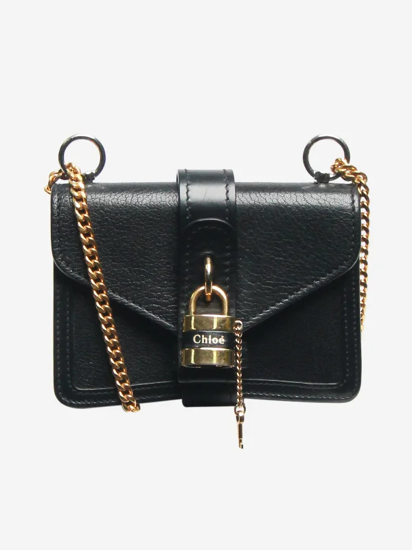 Leather Shoulder Bag with Magnetic Closure in Black for Quick AccessBlack Mini Aby chain leather shoulder bag - size