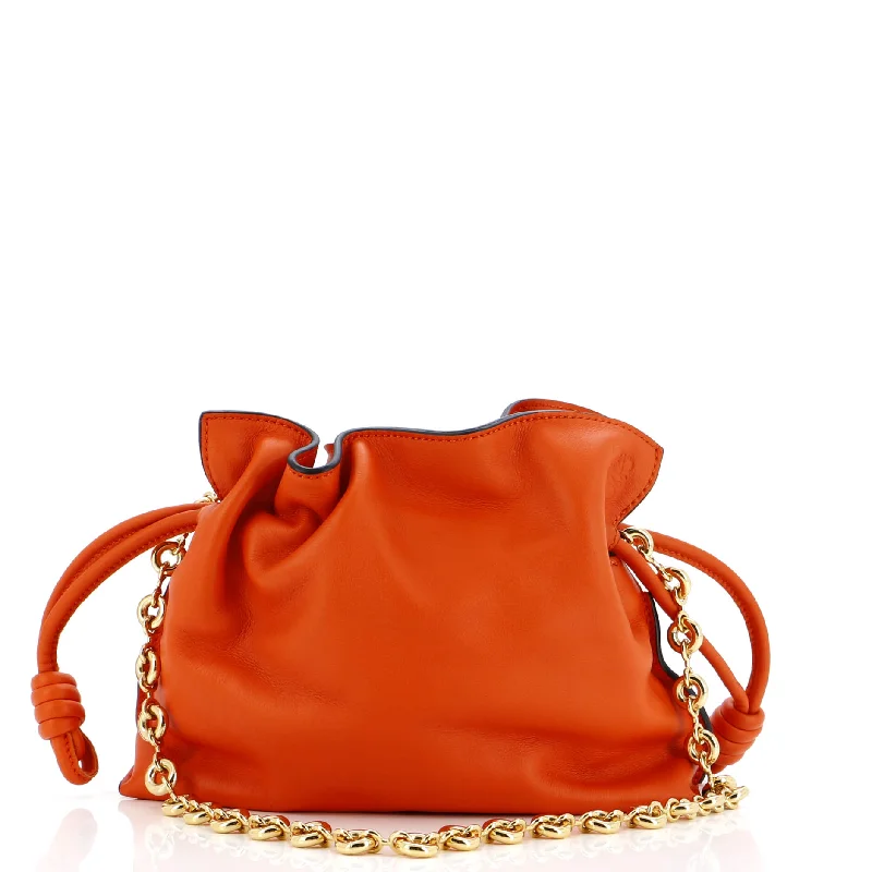 Leather Clutch with Chain Strap in Black for Cocktail PartiesFlamenco Knot Donut Chain Clutch Leather Mini