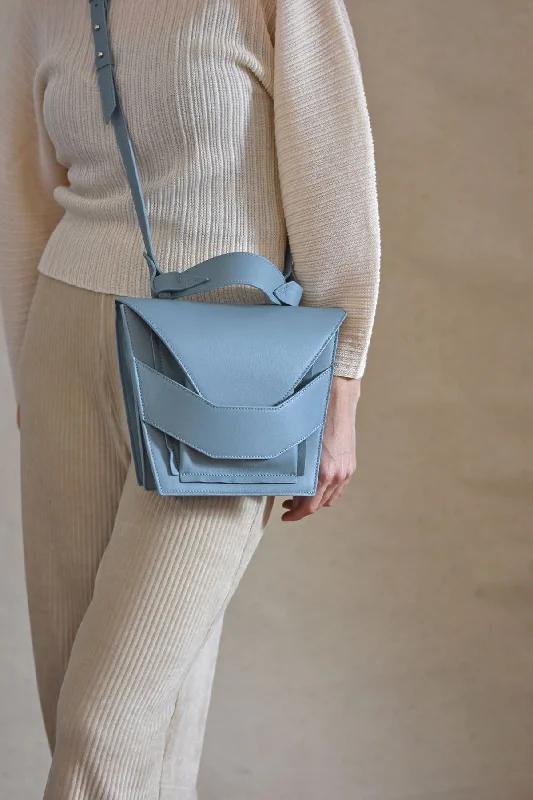 Pvc Shoulder Bag in Clear with Glitter for a Fun and Modern LookLayered Bag - Misty Blue