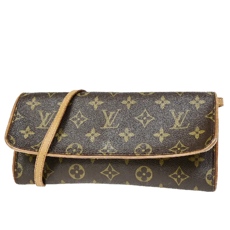 Women's Studded Leather Evening Bag in Black for Rock - n - Roll NightsLouis Vuitton Pochette Twin  Canvas Clutch Bag (Pre-Owned)