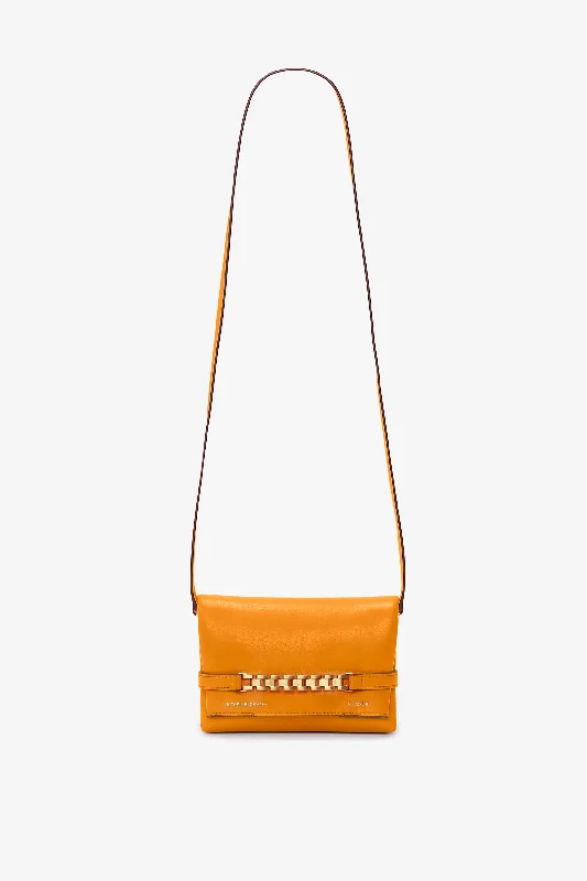 Printed Silk Shoulder Bag in Red for a Pop of ColorMini Chain Pouch Bag With Long Strap In Mandarin Leather