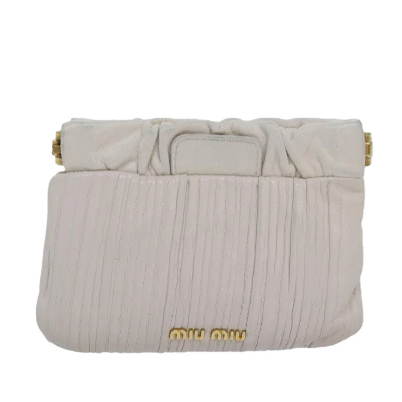 Snake - Skin Effect Clutch in Green for Exotic PartiesMiu Miu Matelassé  Leather Clutch Bag (Pre-Owned)