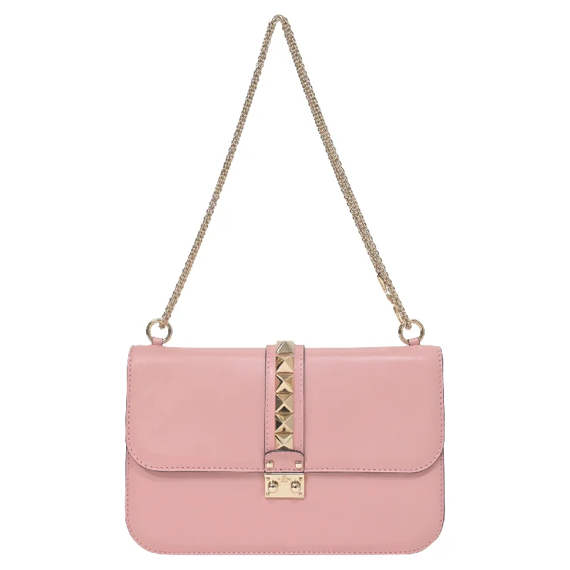 Suede Shoulder Bag in Pink with Tassel Accents for Casual OutingsValentino Medium Rockstud Glam Lock Flap Shoulder Bag in Pink Leather