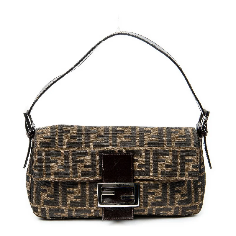 Suede Shoulder Bag in Pink with Tassel Accents for Casual OutingsBaguette