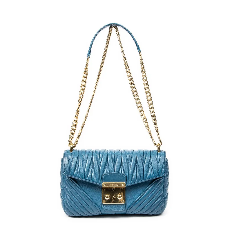Women's Shoulder Bag with Fringe Details in Brown for a Bohemian StyleBiker Chain Bag