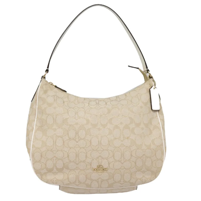Pvc Shoulder Bag in Clear with Glitter for a Fun and Modern LookCoach Signature  Canvas Shoulder Bag (Pre-Owned)
