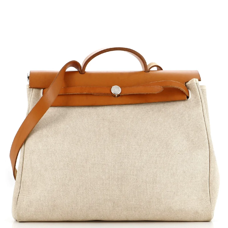 Women's Shoulder Bag with Fringe Details in Brown for a Bohemian StyleHerbag Toile and Leather MM