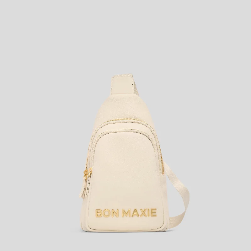 Suede Crossbody Bag in Olive Green for Fall Fashion StatementsThe Multiwear Sling Bag -- Cream Bold Logo