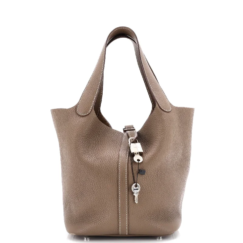 Suede Shoulder Bag in Pink with Tassel Accents for Casual OutingsPicotin Lock Bag Clemence MM