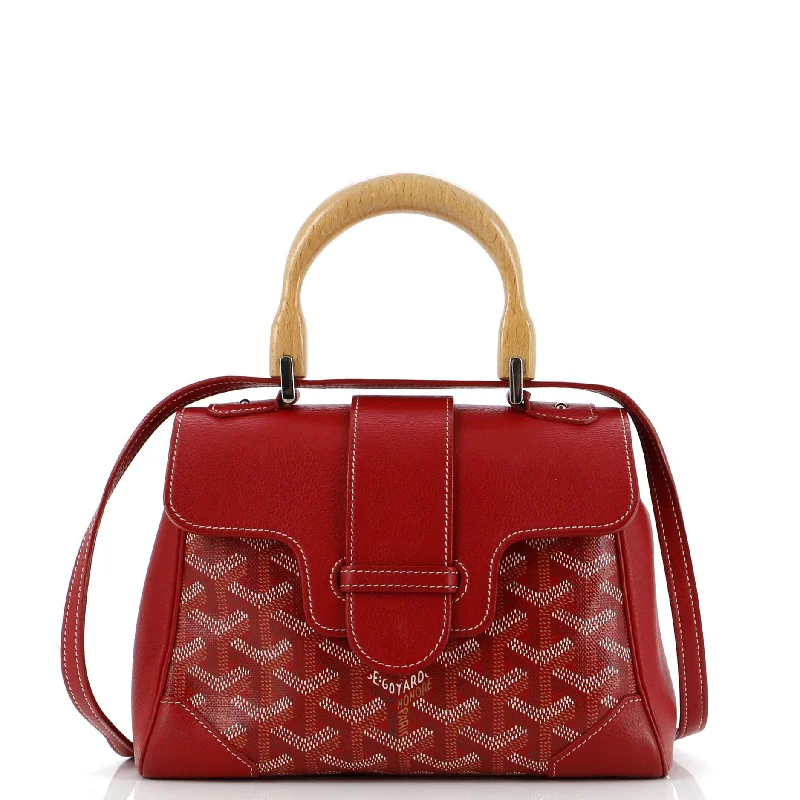 Women's Shoulder Bag with Fringe Details in Brown for a Bohemian StyleSaigon Top Handle Bag Coated Canvas with Leather Mini