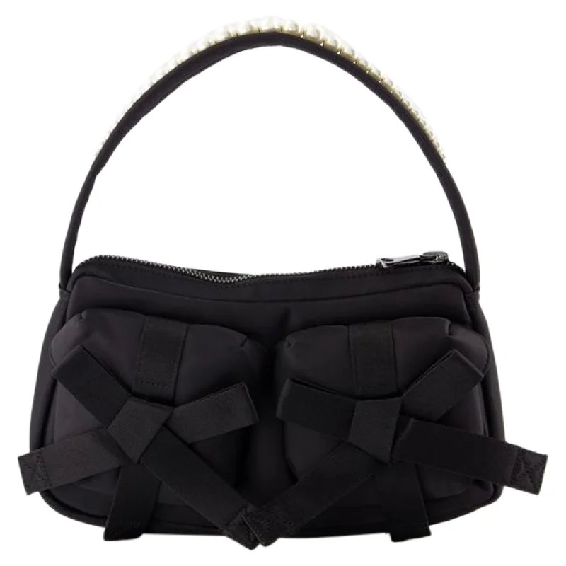 Medium - sized Canvas Crossbody Bag in Beige with Floral Print for Spring OutingsUtility Bow Crossbody - Simone Rocha - Nylon - Black