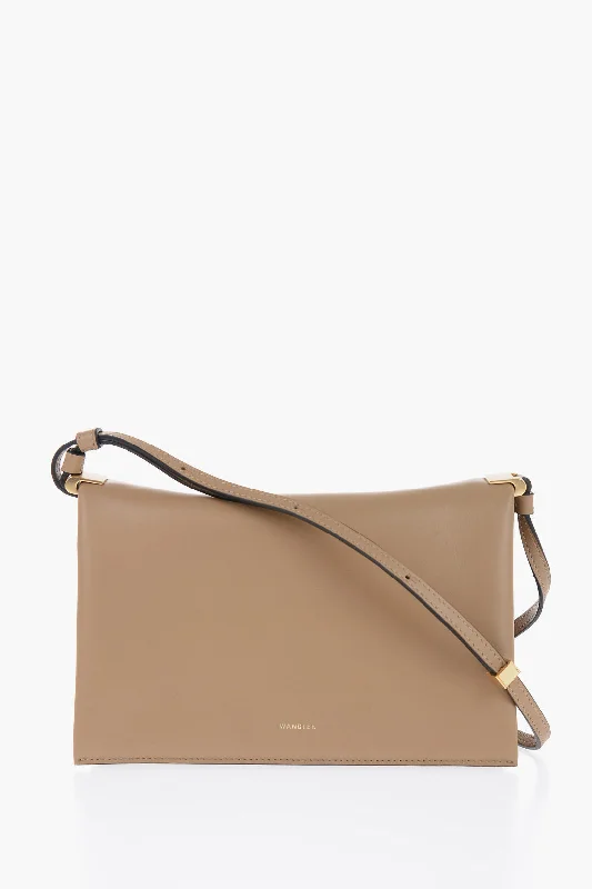 Pvc Shoulder Bag in Clear with Glitter for a Fun and Modern LookWandler Leather Uma Baguette Bag With Snap Closure